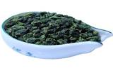 安溪茶品种多毛蟹形紧结粒状, 色泽深绿色, 味清醇